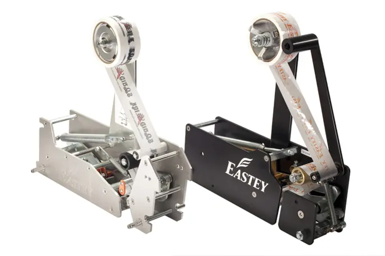 Top and bottom tapeheads of the SB/TB-2 side belt and top belt case taper