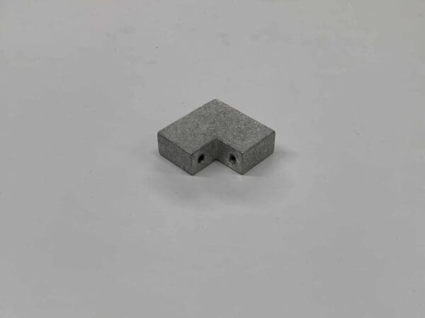 SPACER BLOCK, CORNER EAST0515
