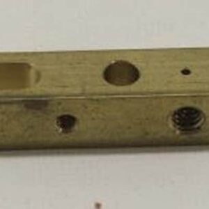Rectangular metal block with various holes.