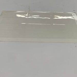 Clear adhesive sheet with grid.