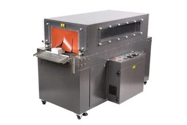 Industrial machine with red interior and controls.